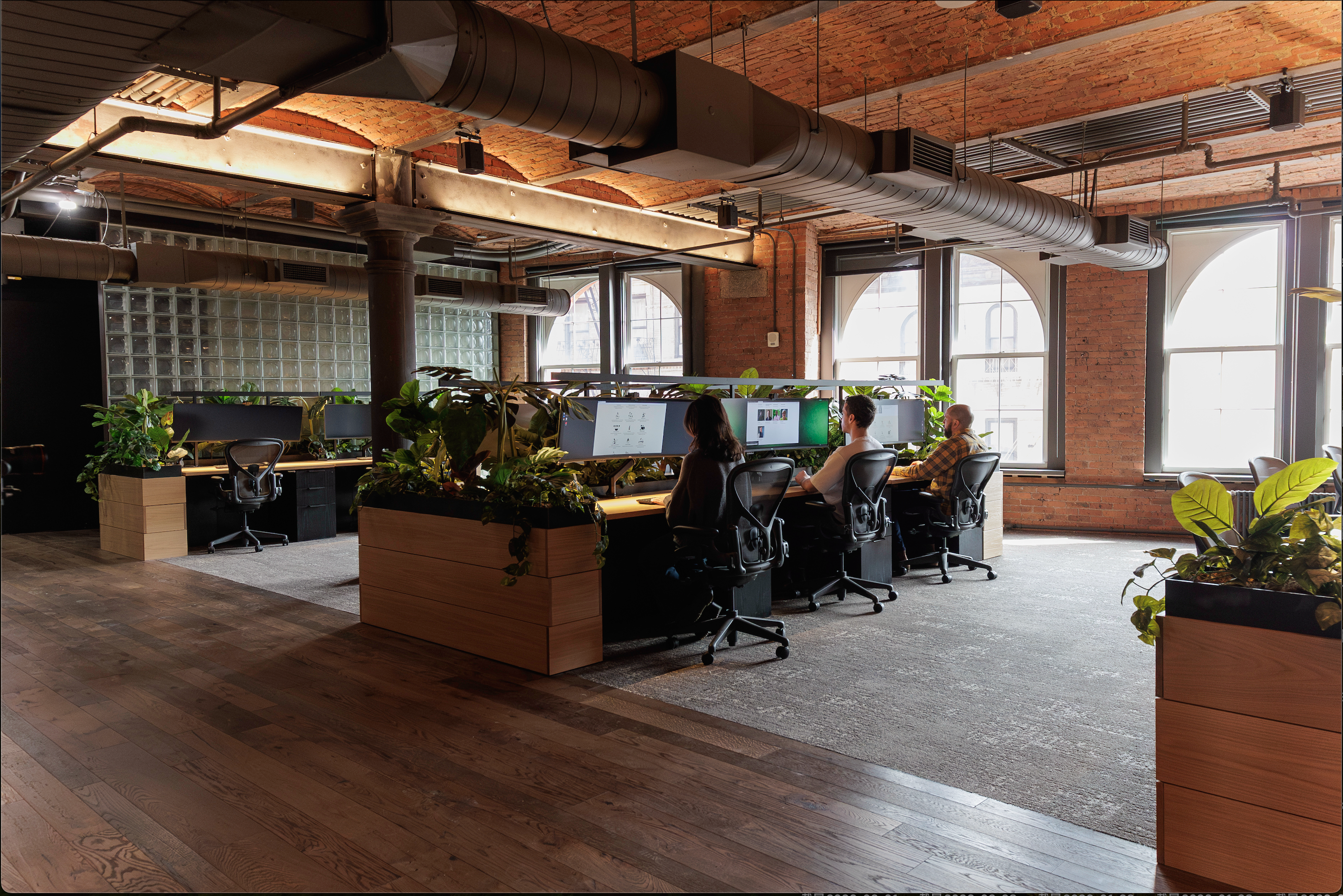 Employees at desk in New York Office