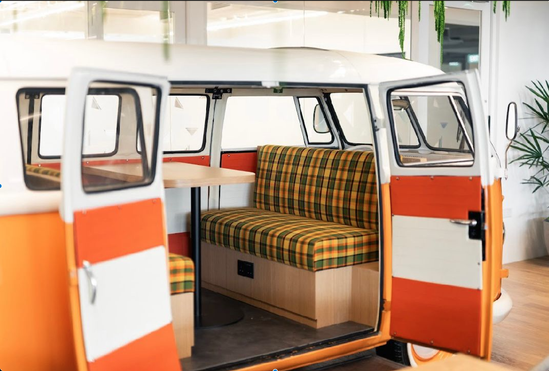 Office breakout space with caravan in the middle