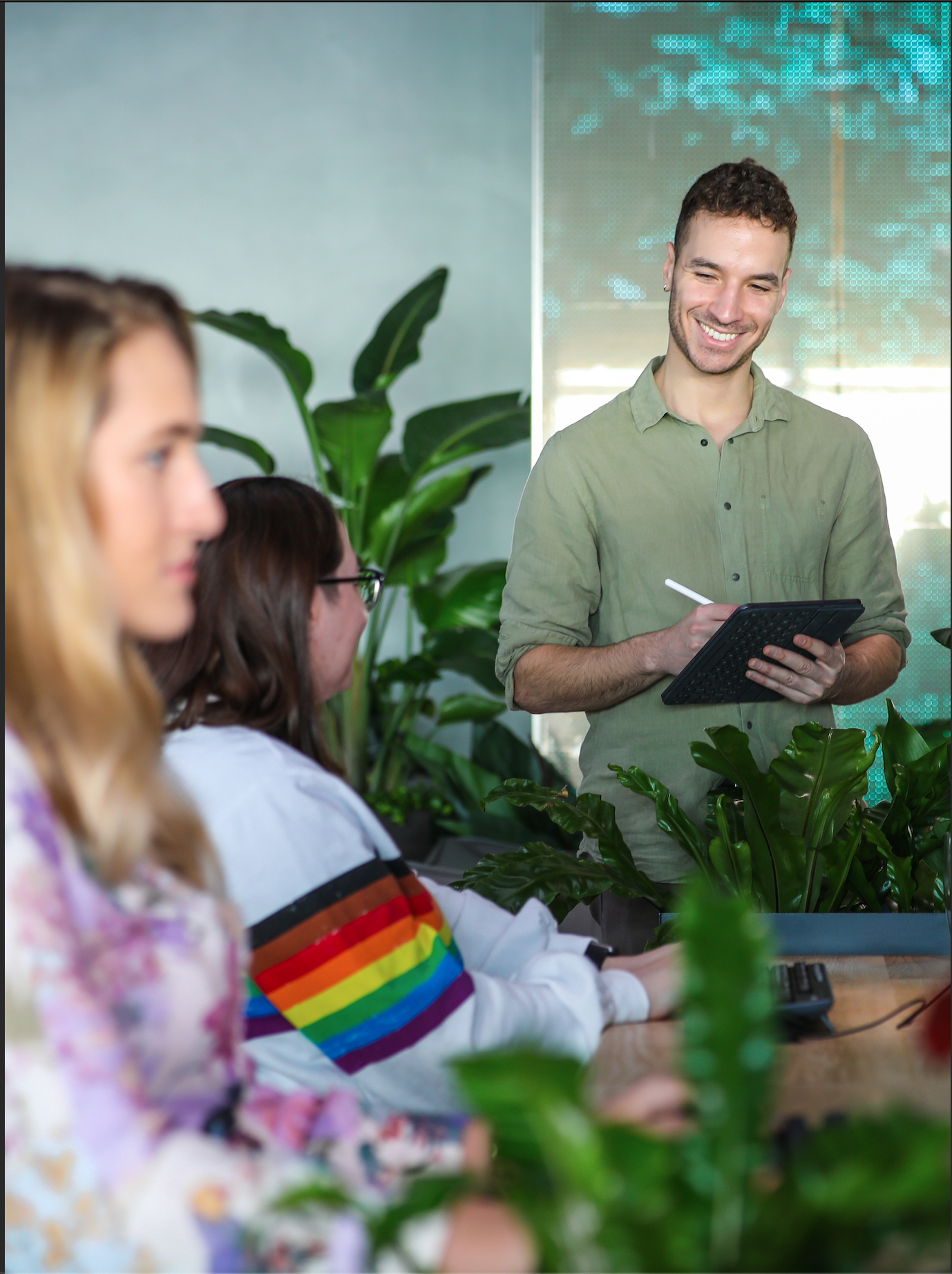 Two Quadrature employees working at desks