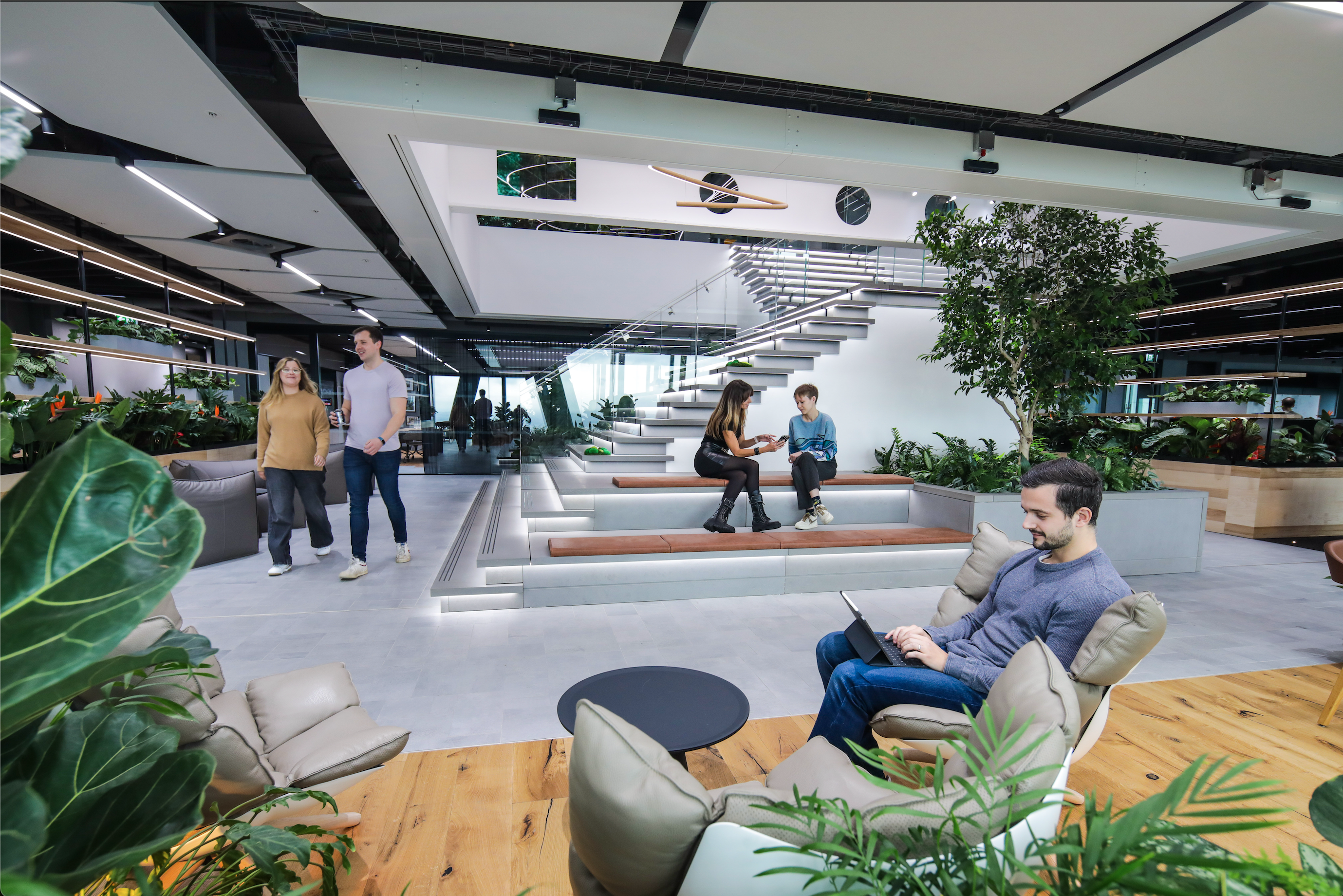 Employees in open working space.